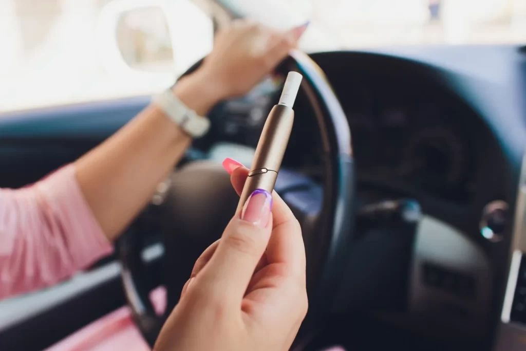 Elf Bar vape with rechargeable battery on road trip